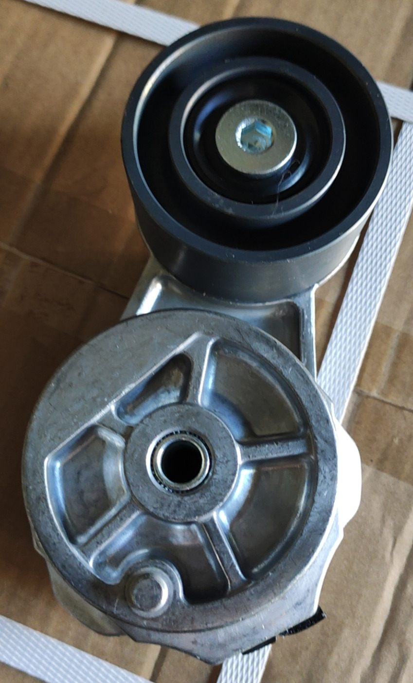 1000175048 BELT TENSIONER